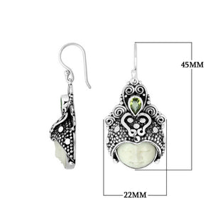 Wholesale sterling silver earrings with Peridot Quartz and carved bone face handcrafted by artisans