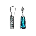 Sterling silver London Blue Topaz Quartz long drop earrings with oxidized finish and earwire lock.