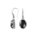 Wholesale sterling silver Black Onyx oval drop earrings with oxidized pattern and mirror-polished finish.