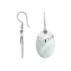 Wholesale sterling silver earrings with Mother Of Pearl ovals and a polished structured silver cap.