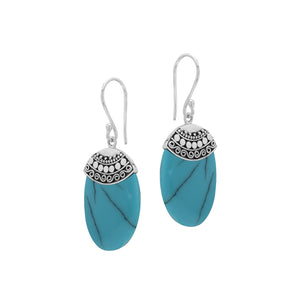 Wholesale sterling silver earrings with Turquoise Shell ovals and an ornate patterned silver cap.