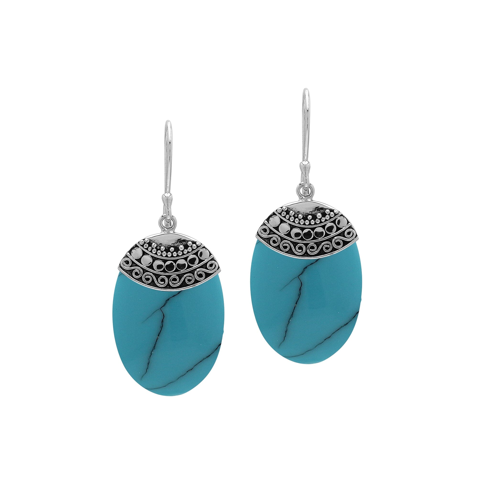 Wholesale sterling silver earrings with Turquoise Shell ovals and an ornate patterned silver cap.