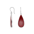 Wholesale sterling silver earrings with Red Coral teardrops set in polished bezel frames.