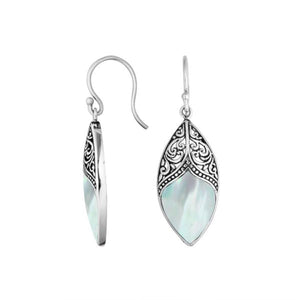 Wholesale sterling silver marquise earrings featuring Mother Of Pearl with ornate decorative silver accents.