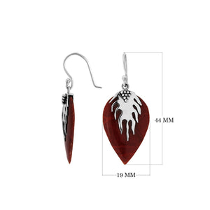 Wholesale silver leaf earrings featuring deep Red Coral with a dramatic sculpted silver design.