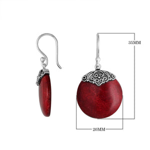 Wholesale sterling silver round earrings with bold Red Coral and refined scrollwork detailing.