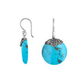 Wholesale sterling silver round earrings with bright Turquoise Shell and decorative scrollwork detailing.