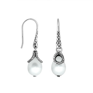 Sterling silver White Pearl earrings with teardrop design and polished finish for wholesale collection.