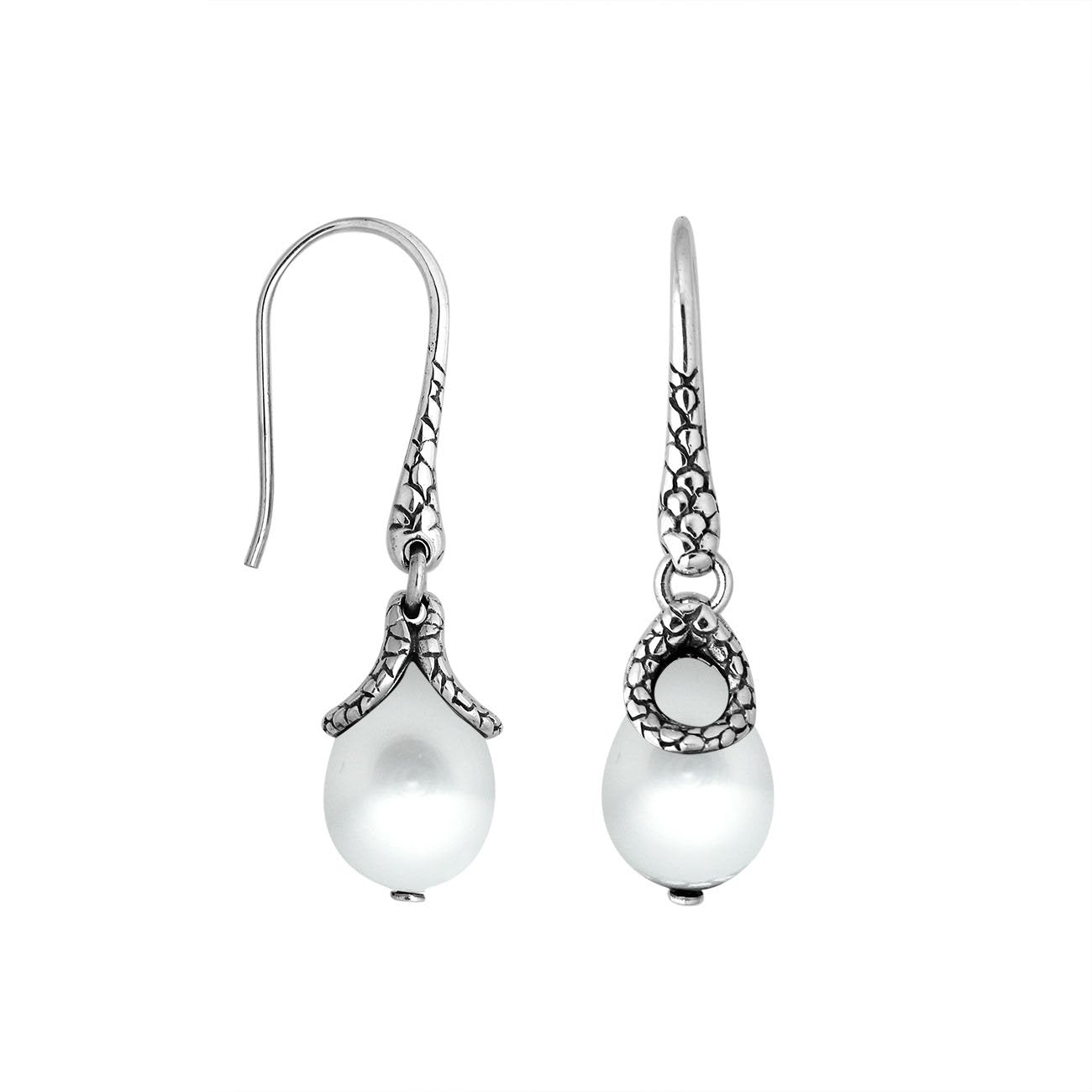 Sterling silver White Pearl earrings with teardrop design and polished finish for wholesale collection.