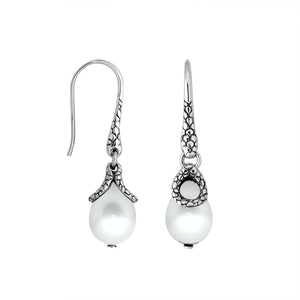 Sterling silver White Pearl earrings with teardrop design and polished finish for wholesale collection.