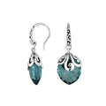 Sterling silver London Blue Topaz Quartz earrings with faceted teardrop design and ornate silver scrollwork for wholesale collection.