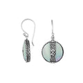 Sterling silver Mother Of Pearl earrings with round design and floral silver center strip for wholesale collection.