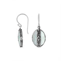 Sterling silver Mother Of Pearl oval earrings with floral silver center band for wholesale jewelry collection.