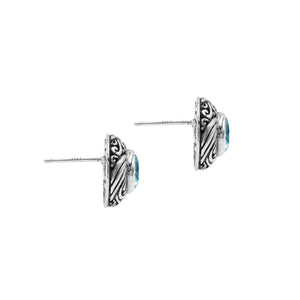 Wholesale Sterling Silver Bali Swirl Blue Topaz Quartz Stud Earrings With Oxidized Detailing Handcrafted In Bali