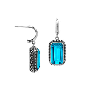 Sterling Silver Blue Topaz Quartz Drop Earrings With Rope Bezel And Scroll Side Detailing