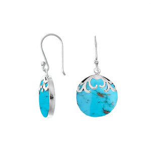 Sterling silver earrings featuring Turquoise Shell round discs topped with detailed filigree accents and a smooth earwire closure, handcrafted in Bali.
