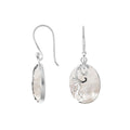 Wholesale sterling silver earrings featuring oval mother of pearl drops with polished wave-motif overlay, crafted for consistent quality, catalog readiness, and elegant presentation suitable for bulk jewelry sourcing.