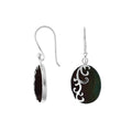 Wholesale sterling silver earrings featuring oval black shell drops with polished wave-motif overlay, crafted to deliver consistent artisan quality and elegant catalog-ready visual appeal for bulk jewelry buyers.