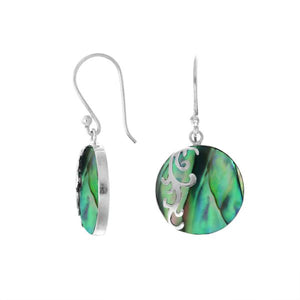 Wholesale sterling silver earrings featuring round abalone shell drops with polished wave-motif overlay, crafted to deliver consistent artisan quality and elegant catalog-ready presentation for bulk jewelry sourcing.