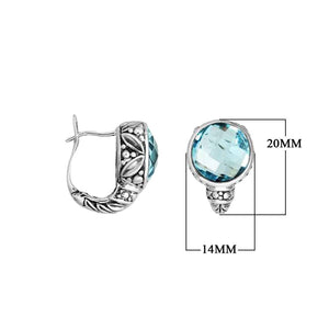 Wholesale sterling silver earrings featuring faceted blue topaz quartz set in ornate Balinese-style silverwork, crafted to provide consistent artisan quality and strong catalog-ready appeal for wholesale jewelry buyers.