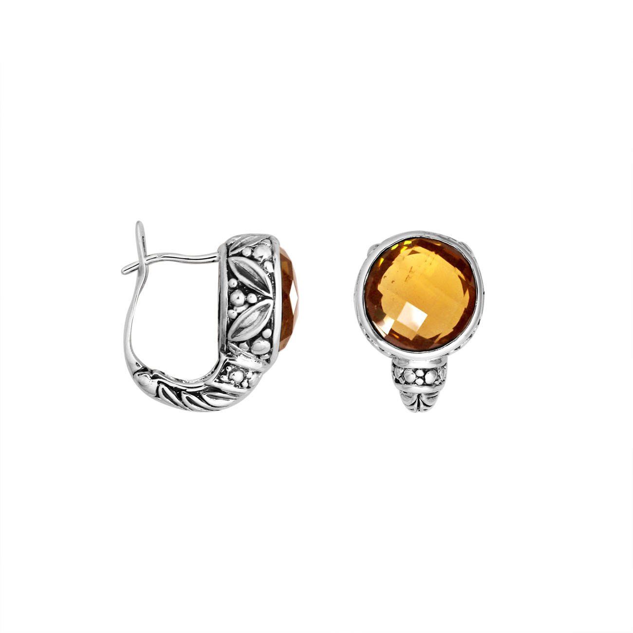 Wholesale sterling silver earrings featuring faceted citrine quartz set in ornate Balinese-style silver detailing, designed to deliver consistent artisan quality and strong catalog-ready presentation for wholesale jewelry buyers.
