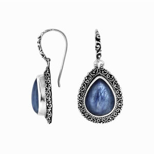 Wholesale sterling silver earrings featuring pear-shaped kyanite cabochons framed in ornate Balinese-style silver detailing, crafted to deliver consistent artisan quality and strong catalog-ready presentation for wholesale jewelry buyers.