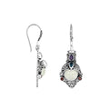 A handcrafted pair of 925 sterling silver earrings featuring carved bone faces, accented with Amethyst Quartz, Blue Topaz Quartz, and Garnet Quartz stones.