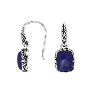 Wholesale sterling silver earrings featuring a cushion-cut Lapis center framed with carved detailing and an earwire lock, offering a refined artisan style ideal for premium jewelry catalogs.