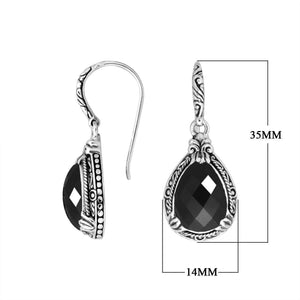 Wholesale sterling silver earrings featuring a bold faceted Black Onyx teardrop framed with textured carved detailing and earwire lock, offering strong contrast and modern artisan appeal for premium wholesale catalogs.