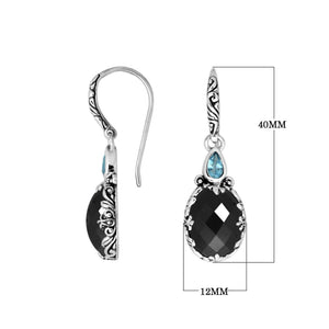 Wholesale sterling silver earrings featuring a bold Black Onyx drop accented with a bright Blue Topaz Quartz teardrop and detailed carved borders for premium catalog presentation.