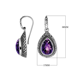Wholesale sterling silver Amethyst Quartz teardrop earwire earrings featuring intricate carved borders, decorative silver beadwork, antique-polished finish, and handcrafted artisanal detailing from Bali.