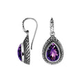 Wholesale sterling silver Amethyst Quartz teardrop earwire earrings featuring intricate carved borders, decorative silver beadwork, antique-polished finish, and handcrafted artisanal detailing from Bali.