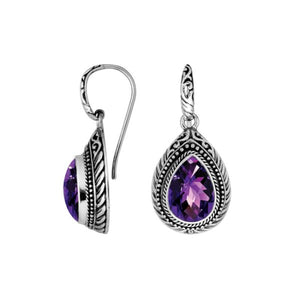 Wholesale sterling silver Amethyst Quartz teardrop earwire earrings featuring intricate carved borders, decorative silver beadwork, antique-polished finish, and handcrafted artisanal detailing from Bali.