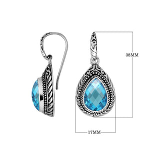 Wholesale sterling silver Blue Topaz Quartz teardrop earwire earrings featuring intricate carved silver borders, decorative bead accents, antique-polished finish, and handcrafted artisanal detailing designed for premium jewelry collections.