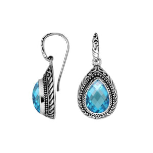 Wholesale sterling silver Blue Topaz Quartz teardrop earwire earrings featuring intricate carved silver borders, decorative bead accents, antique-polished finish, and handcrafted artisanal detailing designed for premium jewelry collections.