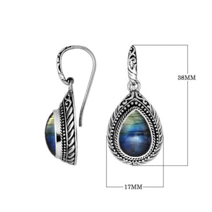 Wholesale sterling silver Labradorite teardrop earwire earrings featuring carved silver borders, decorative bead accents, antique-polished finish, and handcrafted detailing designed for premium jewelry collections.