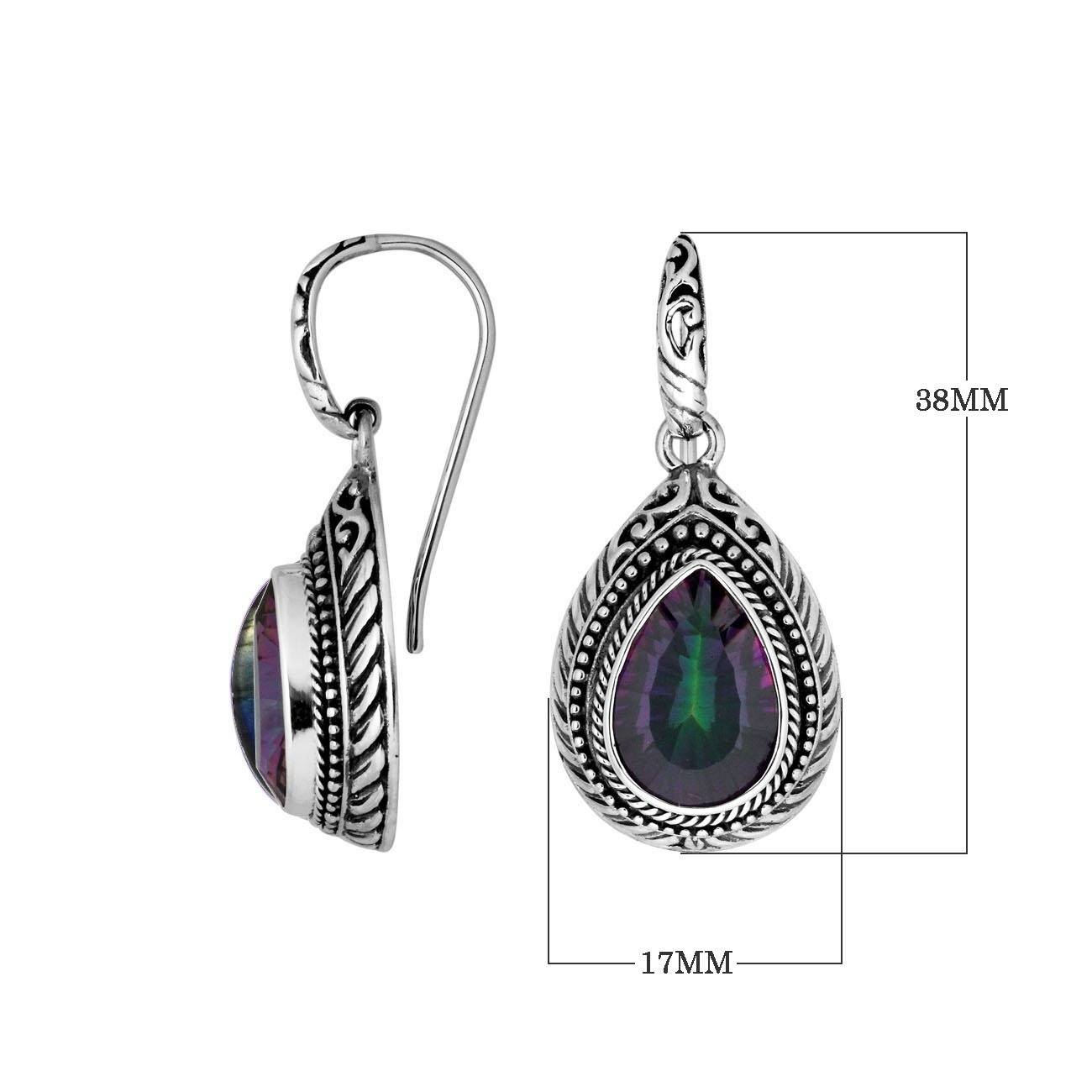 Wholesale sterling silver Mystic Quartz teardrop earwire earrings featuring intricately carved silver borders, decorative bead accents, antique-polished finish, and handcrafted artisanal detailing designed for premium jewelry collections.