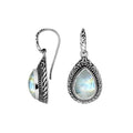 Wholesale sterling silver Rainbow Moonstone teardrop earwire earrings featuring carved silver borders, decorative bead accents, antique-polished finish, and handcrafted artisanal detailing designed for premium boutique jewelry collections.
