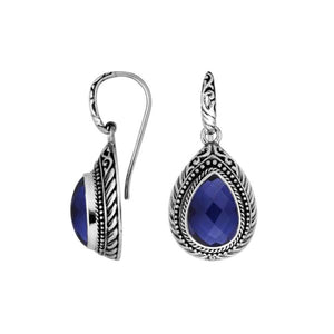 Wholesale sterling silver Sapphire teardrop earwire earrings featuring intricately carved silver borders, decorative bead accents, antique-polished finish, and handcrafted detailing designed for premium boutique and wholesale jewelry collections.