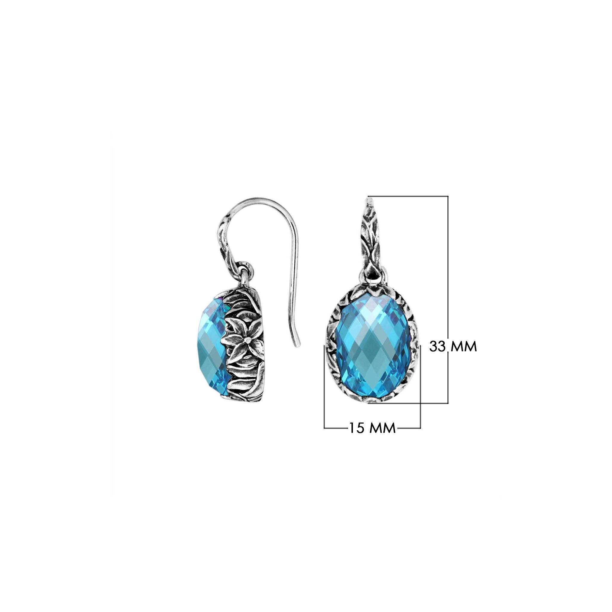 Wholesale sterling silver Blue Topaz Quartz oval earwire earrings featuring floral hand-carved silver detailing, antique-polished finish, secure earwire hooks, and intricate artisan craftsmanship designed for premium wholesale jewelry collections.