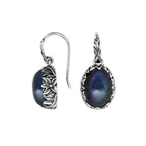 Wholesale sterling silver Labradorite oval earwire earrings featuring floral hand-carved silver detailing, antique-polished finish, secure earwire hooks, and subtle iridescent stone appeal for premium wholesale jewelry collections.