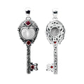 Sterling Silver Garnet And Bone Face Key Pendant
