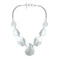 Wholesale sterling silver Mother of Pearl teardrop necklace with Balinese handcrafted design.