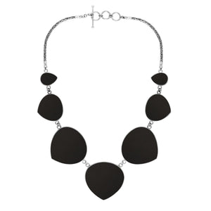 Wholesale sterling silver heart-shape black shell necklace with Balinese handcrafted design.