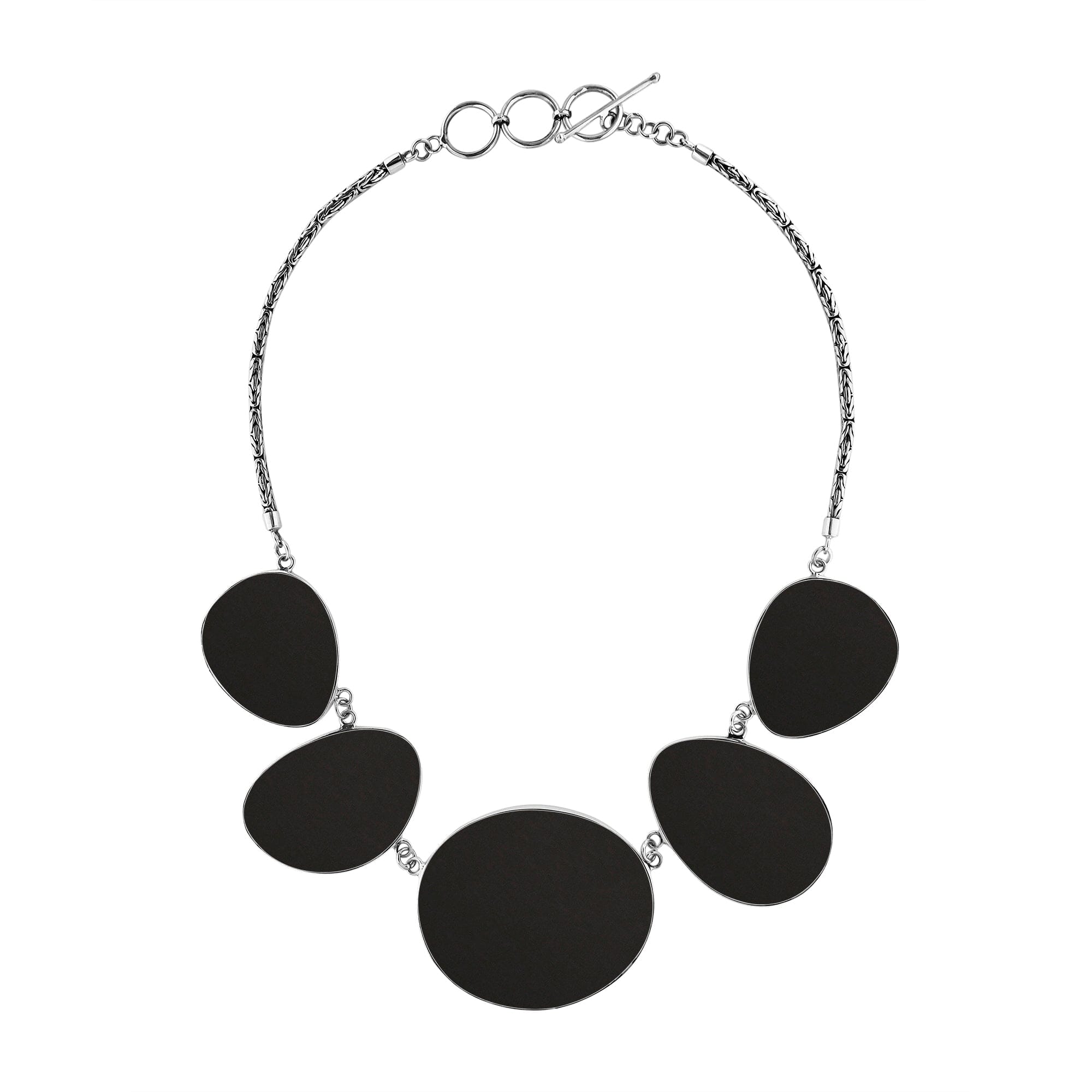 Sterling silver necklace with oval black shell links, polished artisan finish.