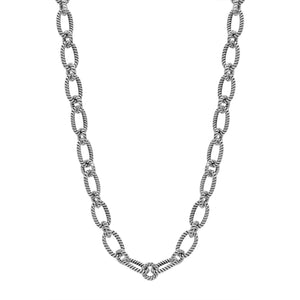 Sterling silver textured rope link chain necklace with toggle clasp.