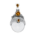 Wholesale sterling silver pendant with hand-carved white shell moon face and faceted Citrine Quartz, Bali scrollwork artisan jewelry for bulk orders.