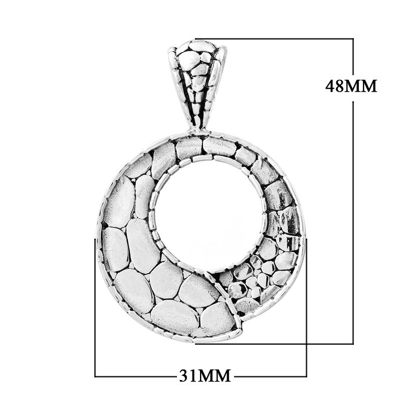 Sterling silver round pendant with pebble-textured design and open circle center, handcrafted Bali jewelry available for wholesale purchase.