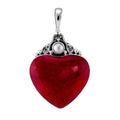 Sterling silver heart pendant with bold red coral centerpiece and round Mother of Pearl accent, handcrafted Bali jewelry available for wholesale purchase.
