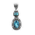 Wholesale sterling silver Blue Topaz pendant with oval and square gemstones, handcrafted Bali filigree design and oxidized finish, artisan jewelry for bulk orders.